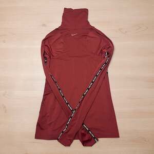 Nike Pro Warm Women's Dri-FIT Funnel Neck Long Sleeve Training Top in Cedar Sml